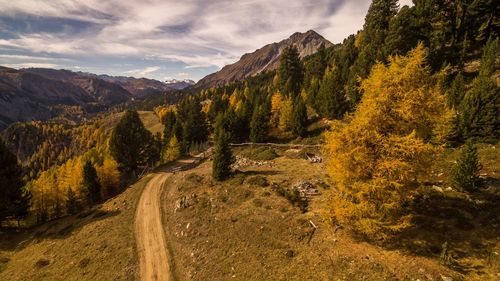 Scenic view of mountain road against sky