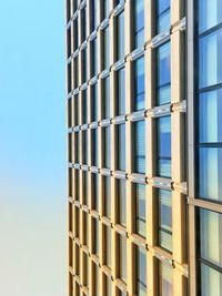 Low angle view of modern building against clear sky