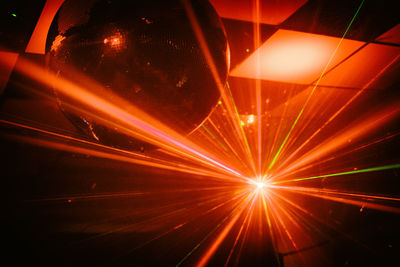 Abstract image of illuminated road in city at night