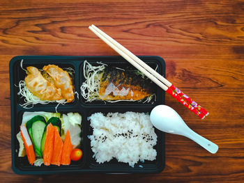 High angle view of sushi served on table