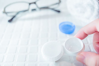 Midsection of person holding mobile phone