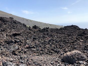 Scenic view of rocky mountains against sky