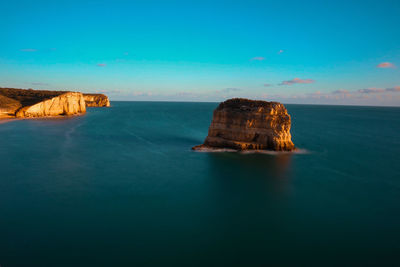 Small rock island in the ocean 