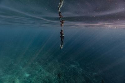 Person swimming in sea