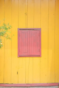 Red window and yellow wall, asian style