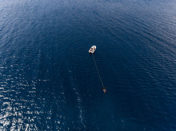 High angle view of people by sea