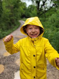 Portrait of boy standing outdoors