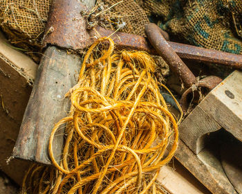 High angle view of ropes on wood