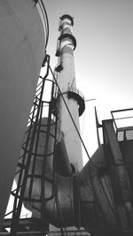 Low angle view of water tower against clear sky