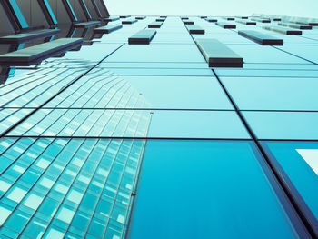 Low angle view of modern glass building