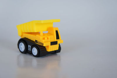 Close-up of toy car against white background