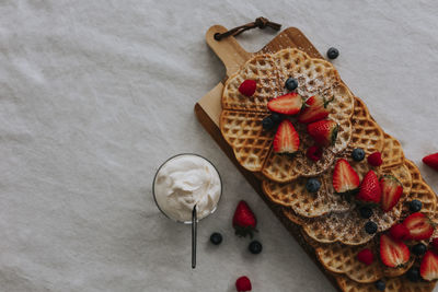 High angle view of waffles with fruits