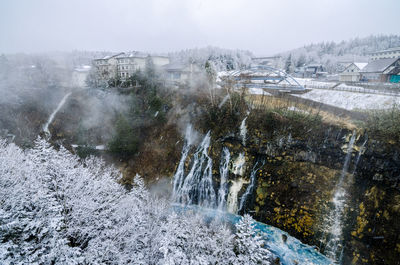 Shirogane hot spring village of biei city, stands this 30m tall white beard waterfall. 