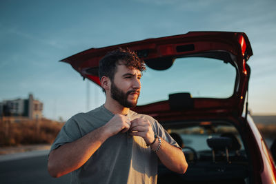 Young man looking at camera