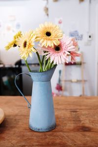 Close-up of flower vase on table