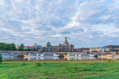 Buildings in city against sky