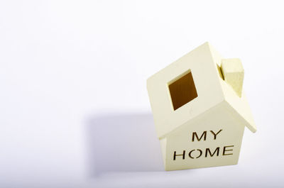 High angle view of model house against white background