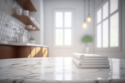 Empty marble table top with blurred bathroom interior background