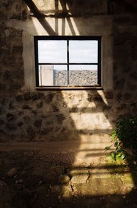 Close-up of window of abandoned house