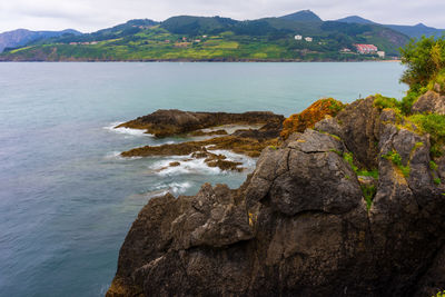 Scenic view of sea and mountains