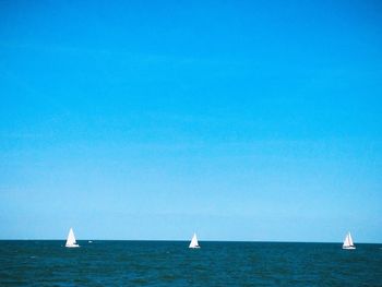 Boat sailing in sea