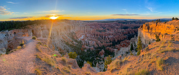 Panoramic view of landscape against sky during sunset