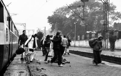 People on road against sky