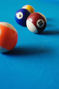 Pool balls on blue table
