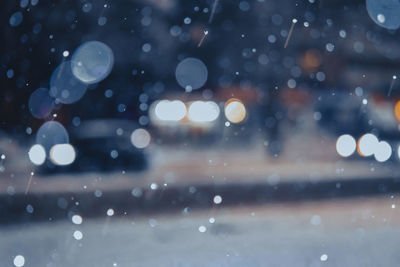 Defocused image of illuminated lights at night