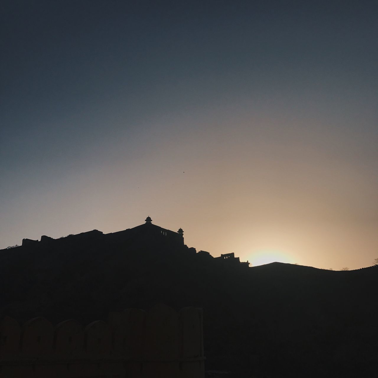 SILHOUETTE MOUNTAINS AGAINST CLEAR SKY