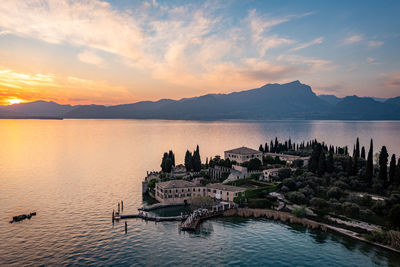 Scenic view of lake against sky during sunset