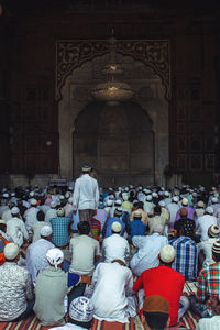 Group of people in front of building