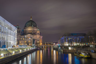 Berlin cathedral by spree river against sky