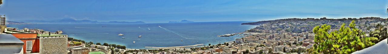 High angle view of sea against blue sky