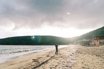 Scenic view of beach against sky