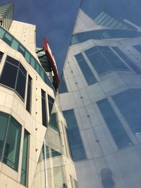 Low angle view of modern building against sky