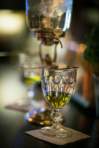 Close-up of wine glass on table in restaurant