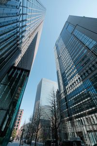 Low angle view of skyscrapers against sky