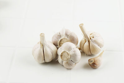 Close-up of garlic on table