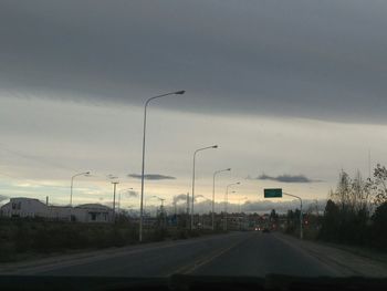 Road against cloudy sky