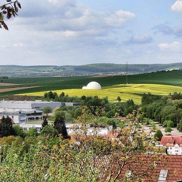 architecture, building exterior, built structure, sky, cloud - sky, house, high angle view, tree, landscape, residential structure, residential building, cloud, nature, town, growth, green color, day, scenics, field, cloudy