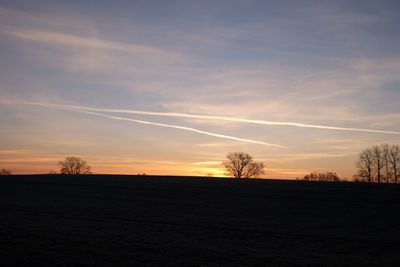 Scenic view of silhouette landscape against sky during sunset