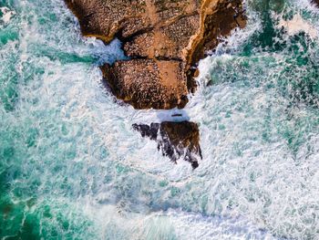 Water splashing on rocks