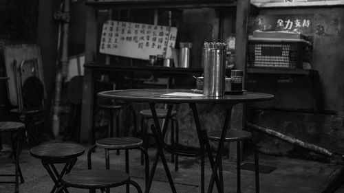 Empty chairs and tables in cafe