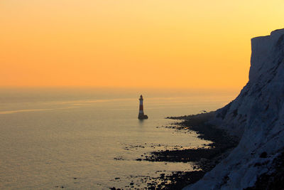 Scenic view of sea against sky during sunset