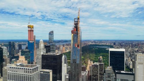 Modern buildings in city against sky