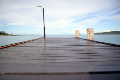 Pier over sea against sky