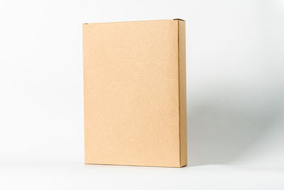 Close-up of open book against white background