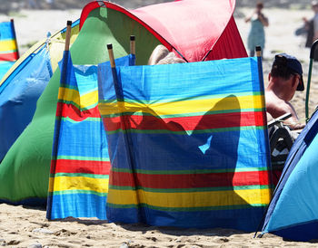 Close-up of tent at beach