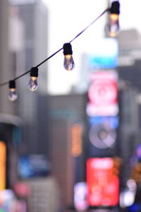 Close-up of illuminated light bulb